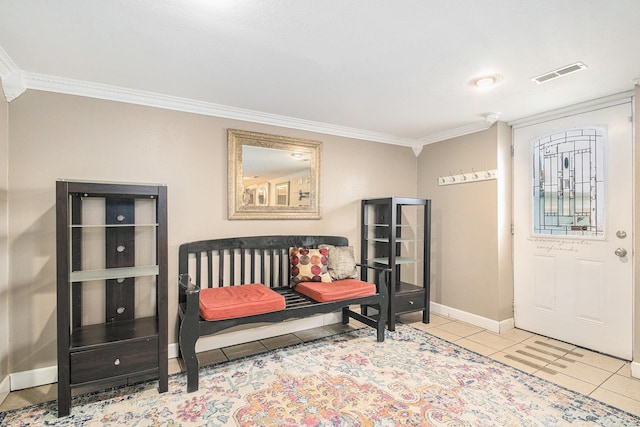 living area with tile patterned floors, baseboards, visible vents, and ornamental molding