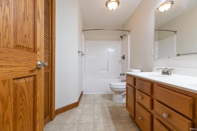 full bath featuring toilet, a sink, double vanity, baseboards, and bathtub / shower combination