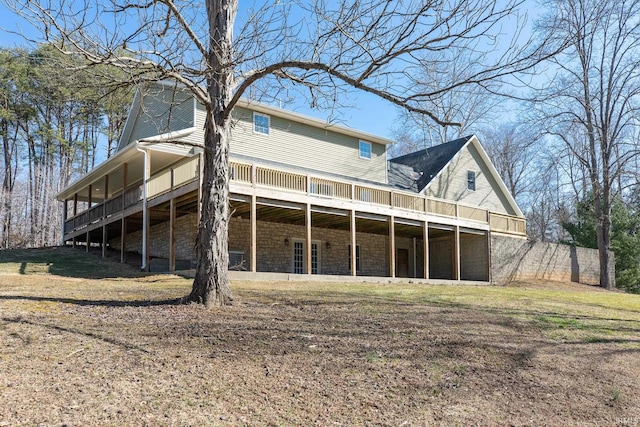 rear view of property with a deck