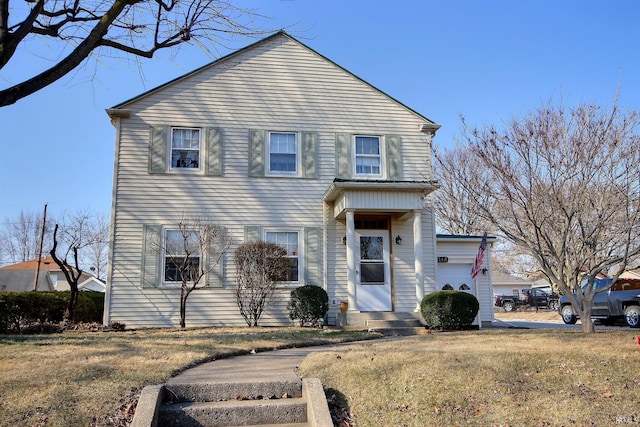 view of front facade with a front lawn