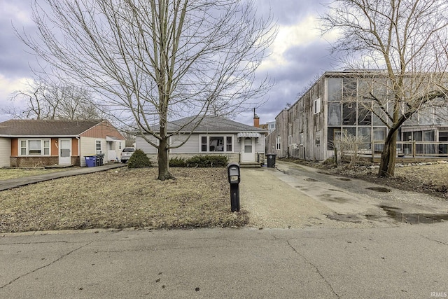 view of front of home featuring brick siding