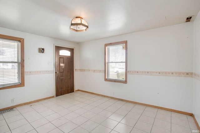 foyer with visible vents and baseboards