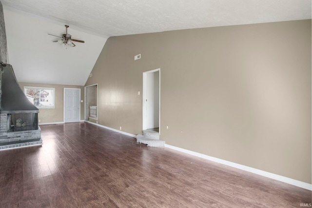 unfurnished living room with baseboards, ceiling fan, and wood finished floors