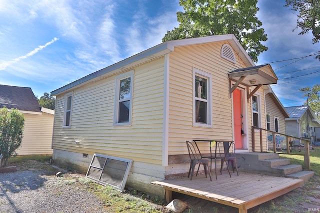 view of home's exterior featuring crawl space