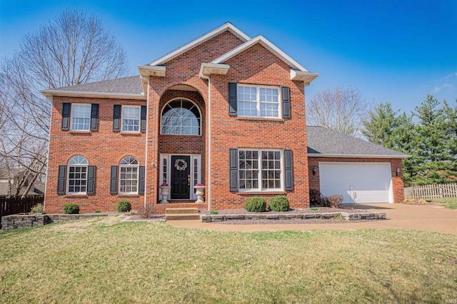 view of front of home with fence, driveway, a front lawn, a garage, and brick siding