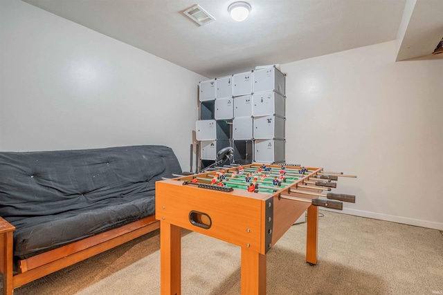 rec room featuring baseboards, visible vents, and carpet floors