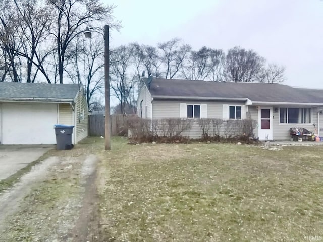 single story home featuring a front yard, fence, a garage, and dirt driveway