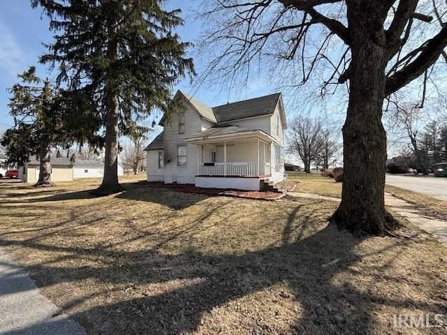 view of home's exterior with a porch