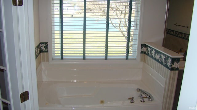 full bathroom featuring a garden tub