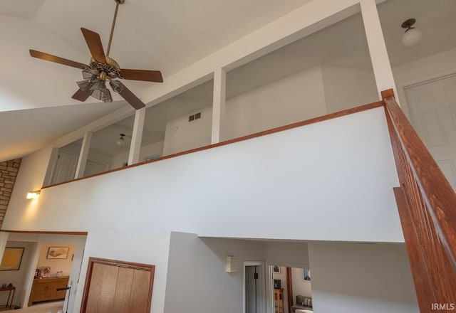 room details featuring visible vents and a ceiling fan