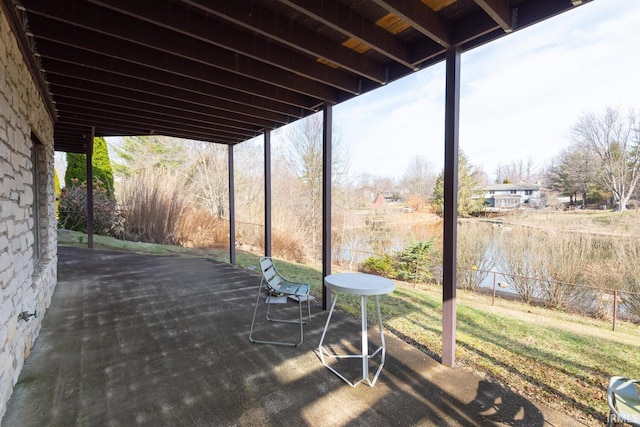 view of patio featuring fence