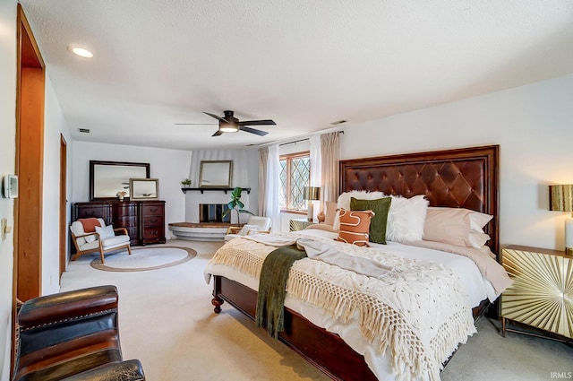 carpeted bedroom with a ceiling fan