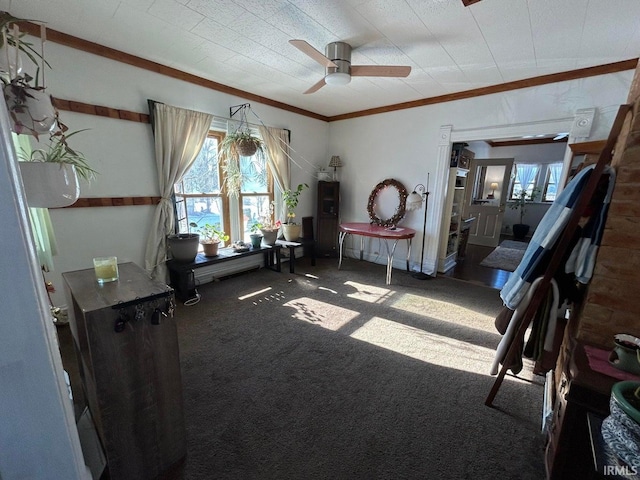 carpeted bedroom featuring connected bathroom, a ceiling fan, and crown molding