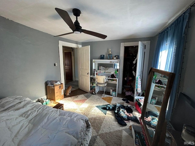 bedroom with carpet floors and ceiling fan