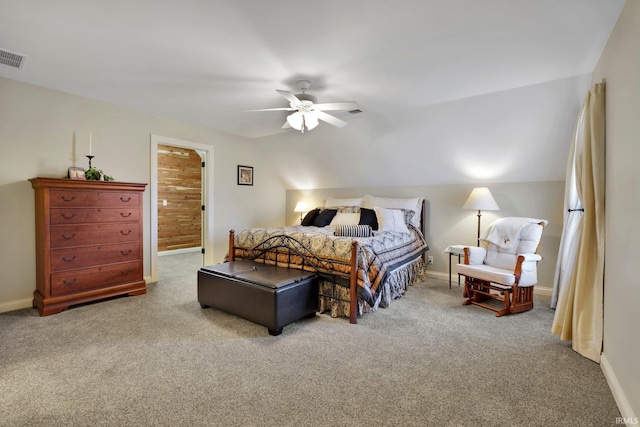 bedroom with lofted ceiling, carpet flooring, a ceiling fan, and baseboards