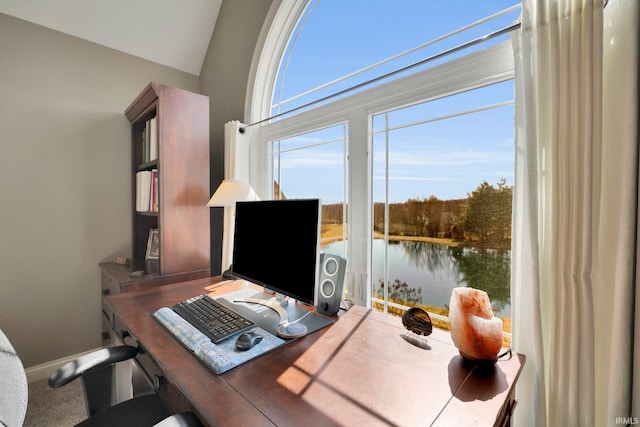 office with baseboards, plenty of natural light, and lofted ceiling