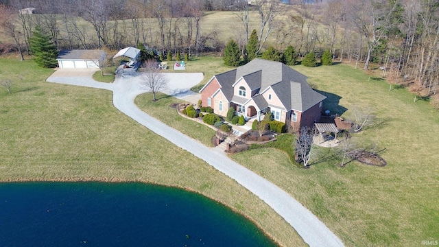 birds eye view of property featuring a water view