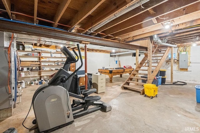 unfinished basement featuring electric panel