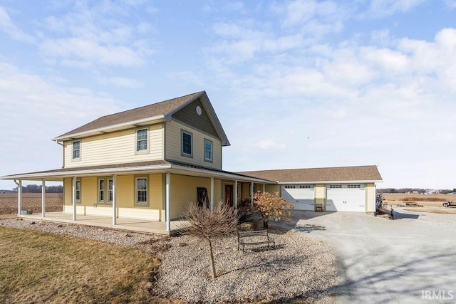 view of front facade featuring driveway and a garage