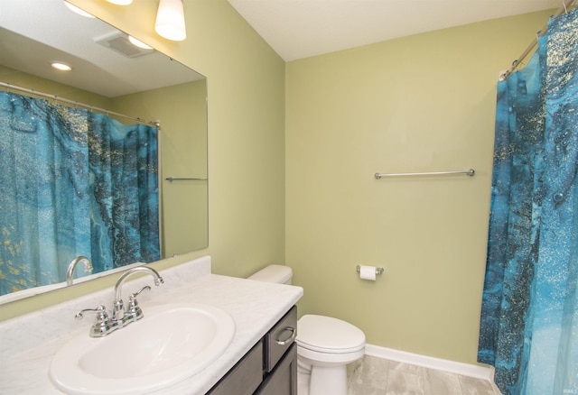 803 Knights Xing, Kendallville, IN 46755 - bathroom with curtained shower, baseboards, toilet, and vanity