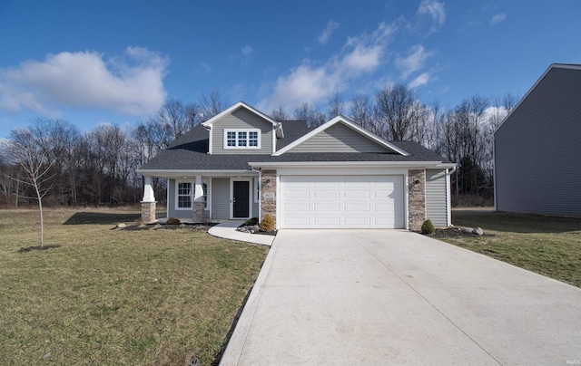 803 Knights Xing, Kendallville, IN 46755 - view of front of house featuring a front yard, roof with shingles, an attached garage, concrete driveway, and stone siding