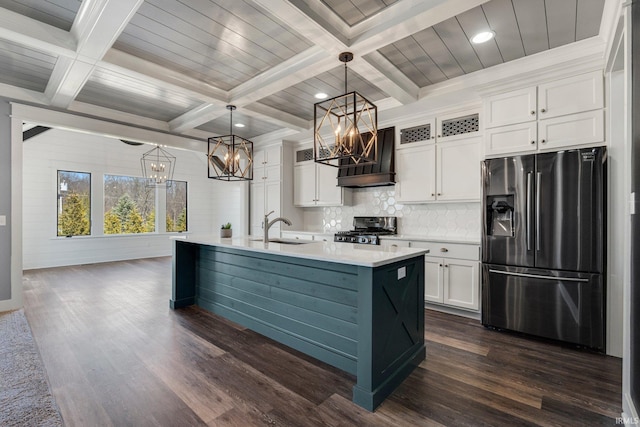 kitchen with stove, a sink, an inviting chandelier, and stainless steel fridge with ice dispenser