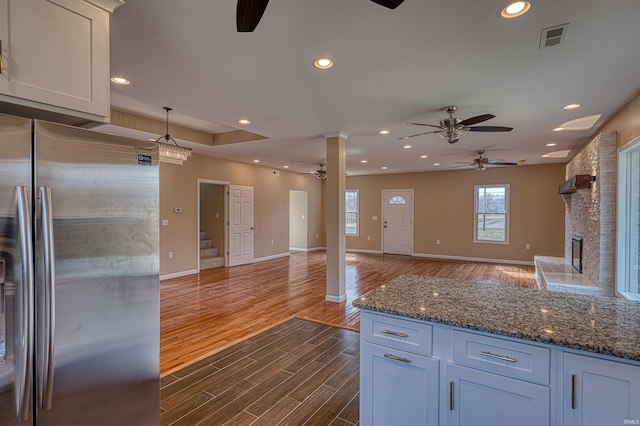 kitchen featuring recessed lighting, visible vents, ceiling fan, and freestanding refrigerator