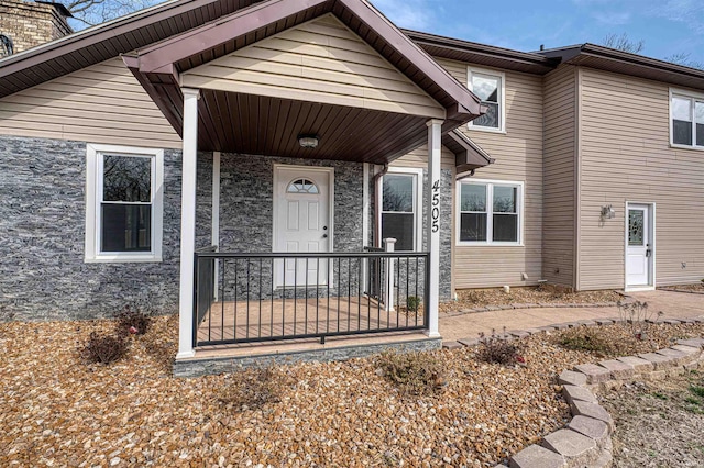 property entrance with a porch