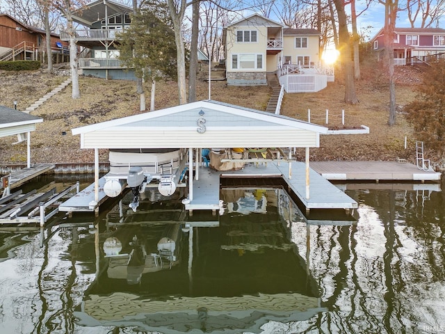 view of dock featuring a water view and boat lift