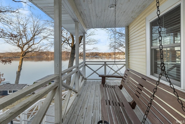 deck featuring a water view