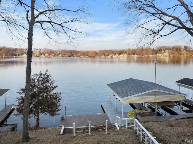 dock area featuring a water view and boat lift