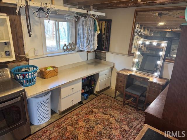 office space with washer / clothes dryer and built in study area