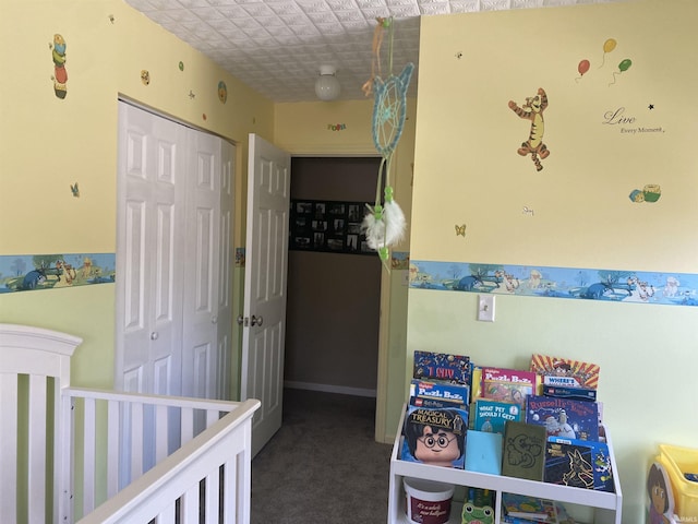 bedroom with a closet and carpet floors