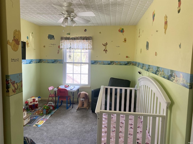 bedroom featuring ceiling fan and carpet flooring