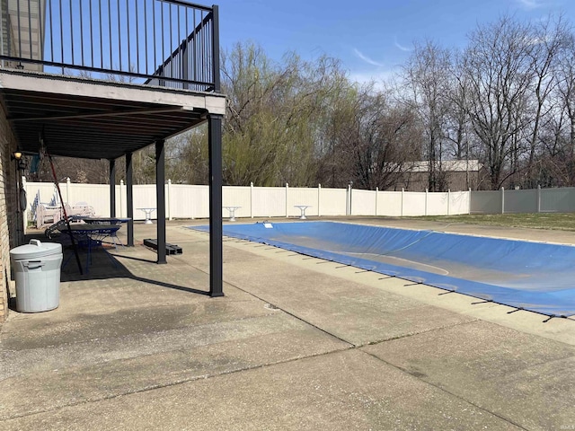 view of pool featuring a fenced in pool, a patio, and a fenced backyard