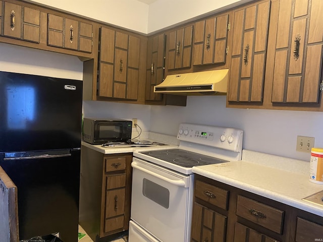 kitchen with black appliances, brown cabinetry, exhaust hood, and light countertops