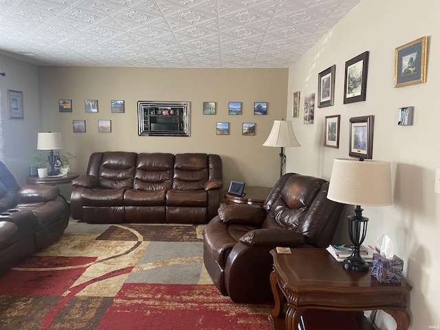 living area with an ornate ceiling