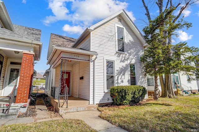 view of front of home with a front yard