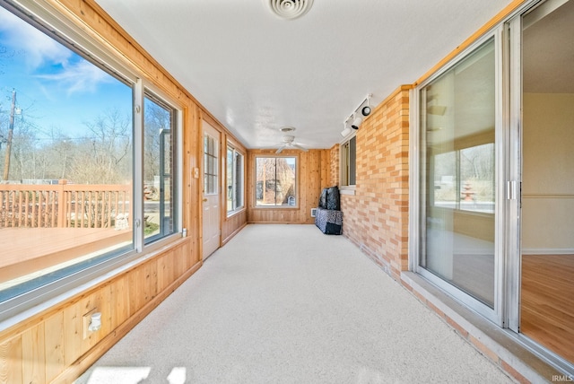 sunroom / solarium with visible vents