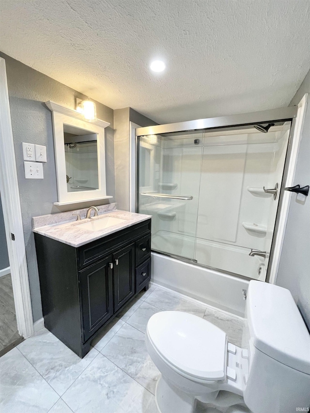 bathroom featuring enclosed tub / shower combo, marble finish floor, toilet, and vanity
