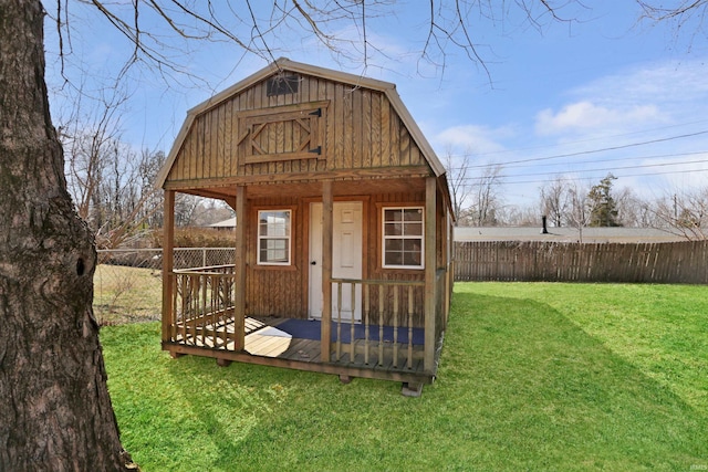 view of outbuilding with an outbuilding and a fenced backyard