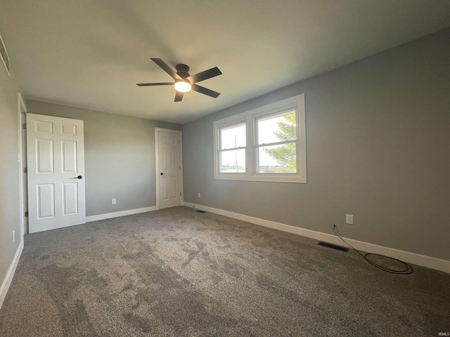 unfurnished bedroom with visible vents, baseboards, and carpet flooring