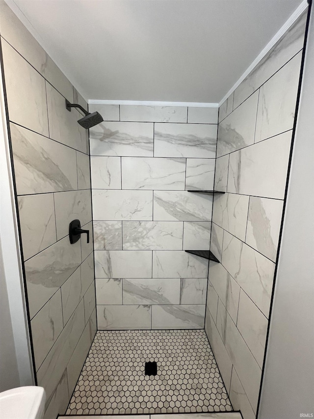 full bathroom with a shower stall