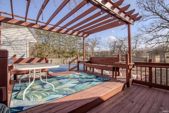 deck with fence and a pergola