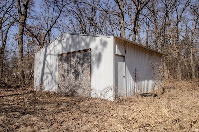 view of outbuilding with an outdoor structure