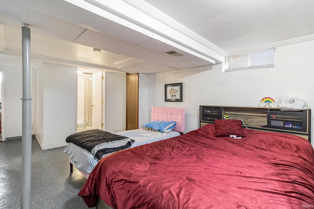 bedroom featuring visible vents