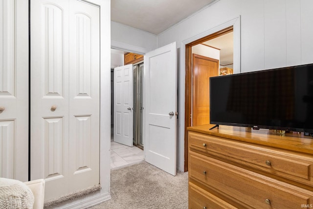 bedroom with light carpet