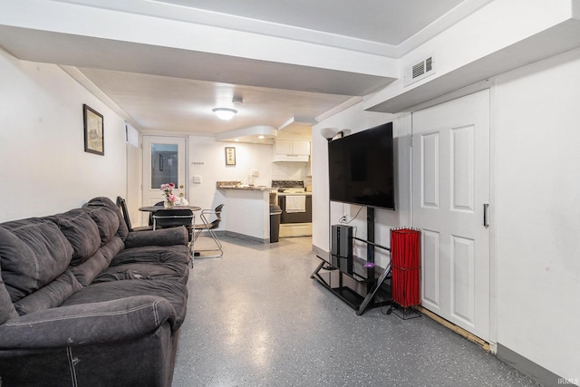 living area featuring visible vents