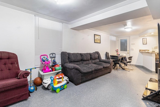 living area with speckled floor