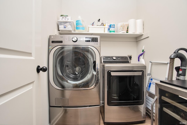 laundry area featuring laundry area and washing machine and dryer